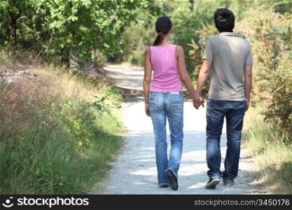 backview of a couple walking