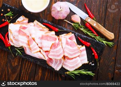 bacon with spice on the black board