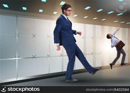 Bad angry boss kicking employee in business concept