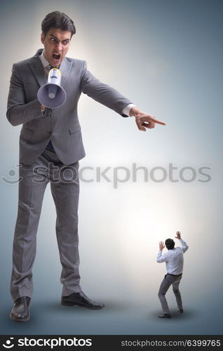 Bad angry boss shouting at employee with loudspeaker