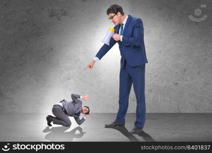 Bad angry boss shouting at employee with loudspeaker