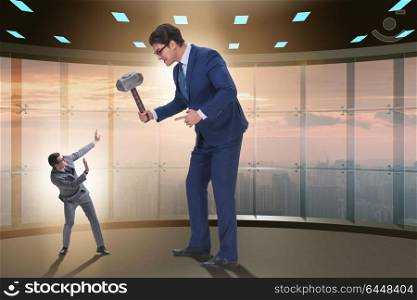 Bad angry boss threatening employee with hammer