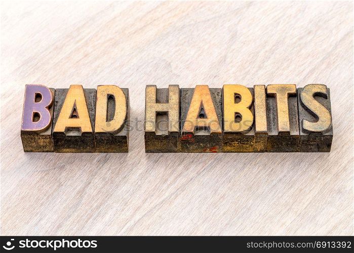 bad habits - word abstract in vintage letterpress wood type printing blocks