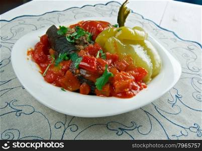 Badimcan, biber, pomidor dolmasi - Stuffed aubergines, peppers and tomatoes.popular dolma across Azerbaijan.