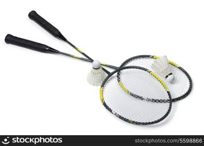 Badminton rackets and shuttlecocks isolated on white