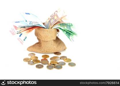 Bag full of euro money notes and coins on a white background