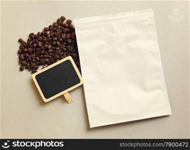 Bag of coffee and blank blackboard with coffee beans, retro filter effect