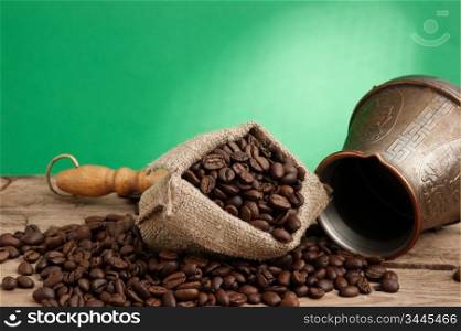 bag of coffee beans and an coffee maker