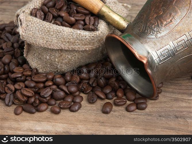 bag of coffee beans and an coffee maker