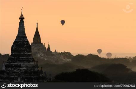 Bagan at sunrise with hot air balloon, Myanmar