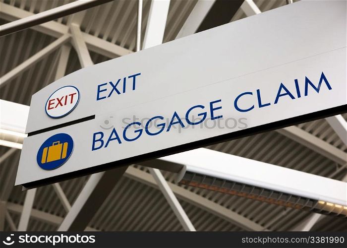 Baggage claim and exit sign in an airport