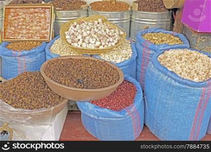 Bags full of raisins, nuts, peanuts, garlic and figs at the market in Morocco
