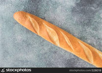 Baguette on the wooden background