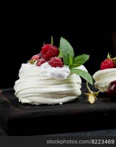 Baked cake made from whipped chicken protein and cream, decorated with fresh berries. 