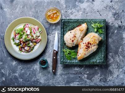 Baked chicken breast stuffed with greens.Delicious chicken with herb. Grilled healthy chicken breasts