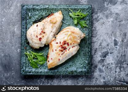 Baked chicken breast stuffed with spinach.Grilled chicken breast. Grilled healthy chicken breasts