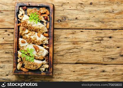 Baked chicken breast stuffed with various nuts.. Stuffed chicken breast with nuts.