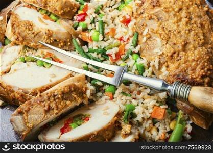 Baked chicken breast with vegetables and a side dish of risotto.Roasted chicken meat.Grilled chicken. Baked meat and risotto