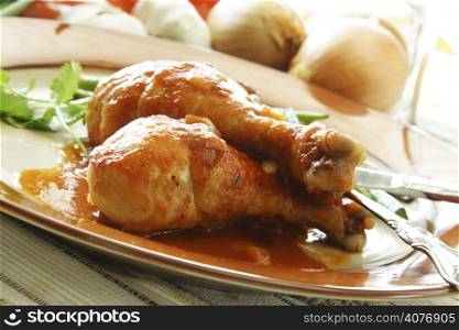 Baked chicken in tomato sauce with green beans on the side