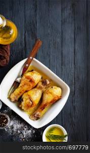 baked chicken legs with aroma spice in bowl