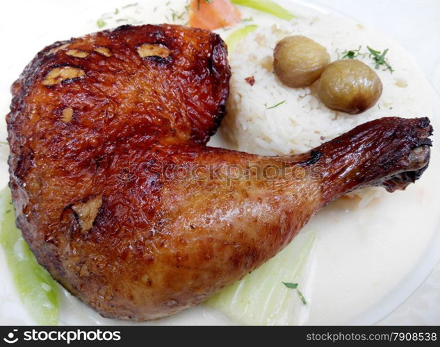 Baked chicken legs with rice and vegetables