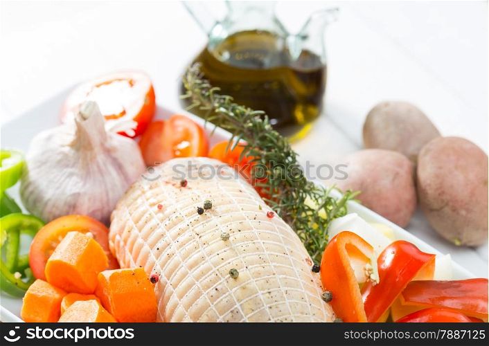 Baked chicken stuffed with fresh raw vegetables