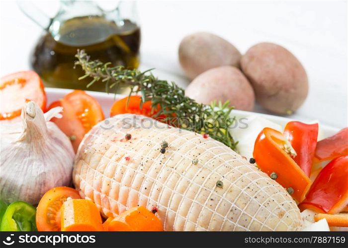 Baked chicken stuffed with fresh raw vegetables