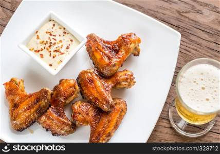 Baked chicken wings with spicy sauce