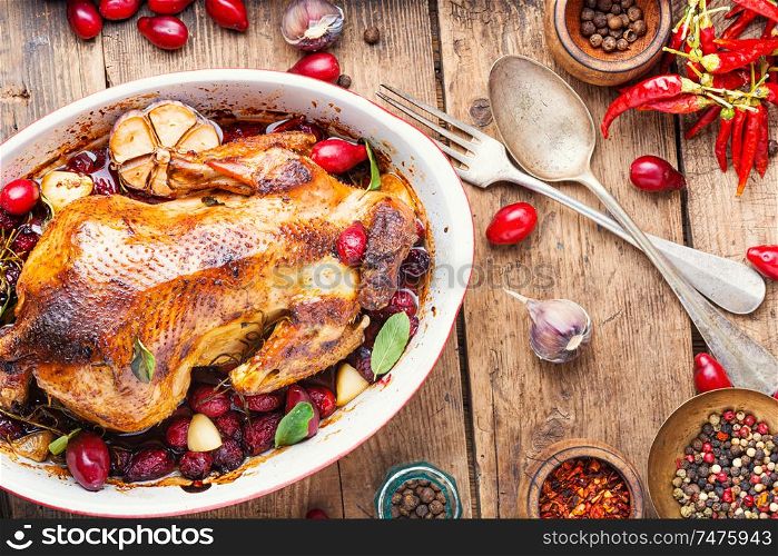 Baked chicken with dogwood.Roast chicken in berry sauce. Baked chicken in berry sauce