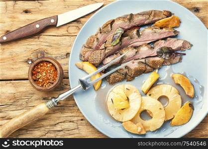 Baked duck breast with pineapple sauce.Grilled duck breast slices. Roasted duck with pineapple