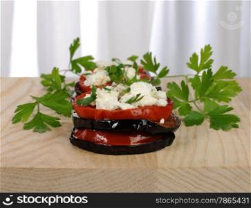 Baked eggplant with ricotta and tomato
