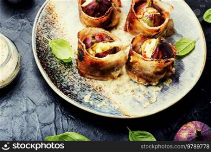 Baked figs with cheese and bacon. Festive snack. Fall recipe. Figs baked in meat bacon