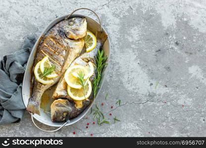 Baked fish dorado. Sea bream or dorada fish grilled