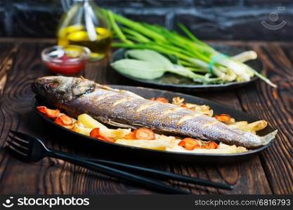 baked fish with vegetable on a table