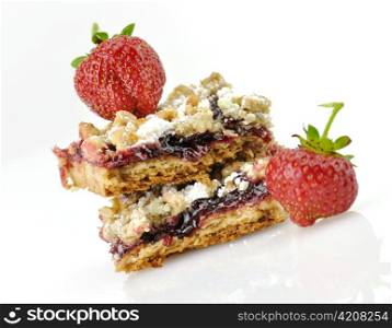 baked fruit bars filled with strawberry jam and fresh berries