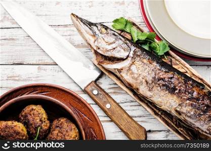 Baked grilled fish.Pike fish stuffed with mushrooms.Pike royally. Russian cuisine. Pike stuffed with vegetables