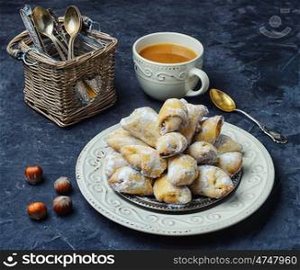 baked homemade cookies. Homemade pastry stuffed with nuts in blue background