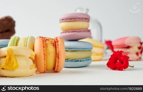 baked macarons on a white table, gourmet almond flour dessert, close up