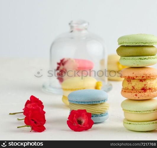 baked macarons on a white table, gourmet almond flour dessert, close up