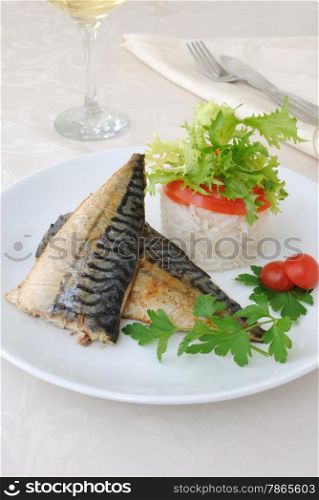 Baked mackerel with rice under vegetables