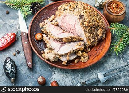 Baked meat under a bread crust.Roasted beef. Baked meat for Christmas