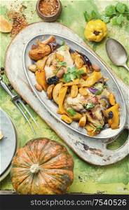 Baked meat with pumpkin and quince.Chicken stew with pumpkin.. Chicken ragout with pumpkin
