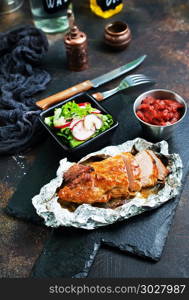 baked meat with spice. baked meat with spice, meat in foil,stock photo