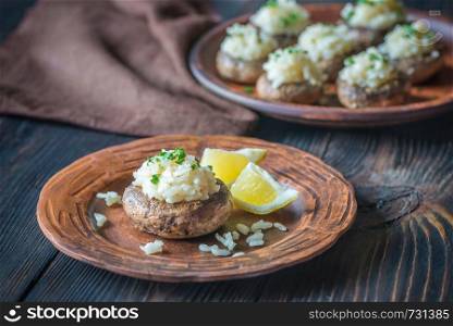 Baked mushrooms stuffed with risotto