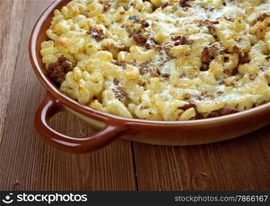 baked pasta casserole with cheese and beef. close up