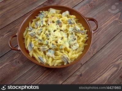 Baked pasta penne with mackerel and cheese