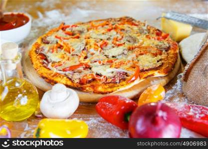 Baked pizza with diferent ingredients