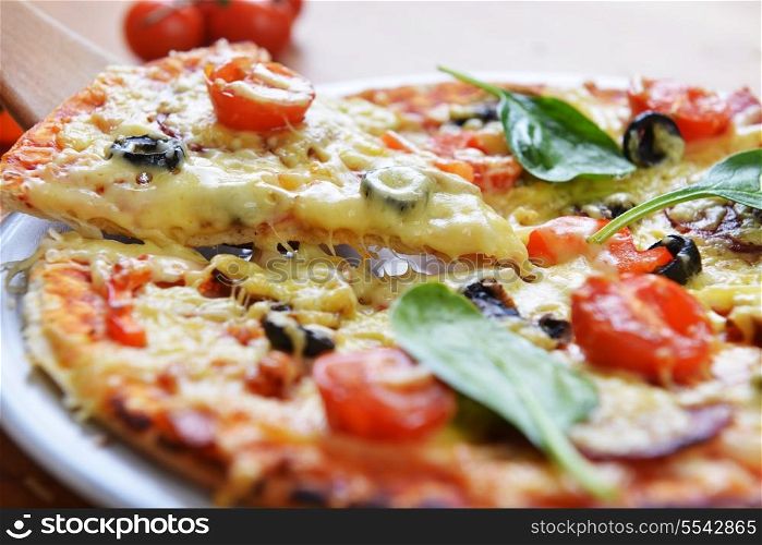 baked pizza with diferent ingredients&#xA;