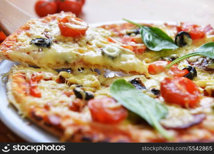 baked pizza with diferent ingredients&#xA;