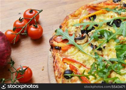 baked pizza with diferent ingredients&#xA;